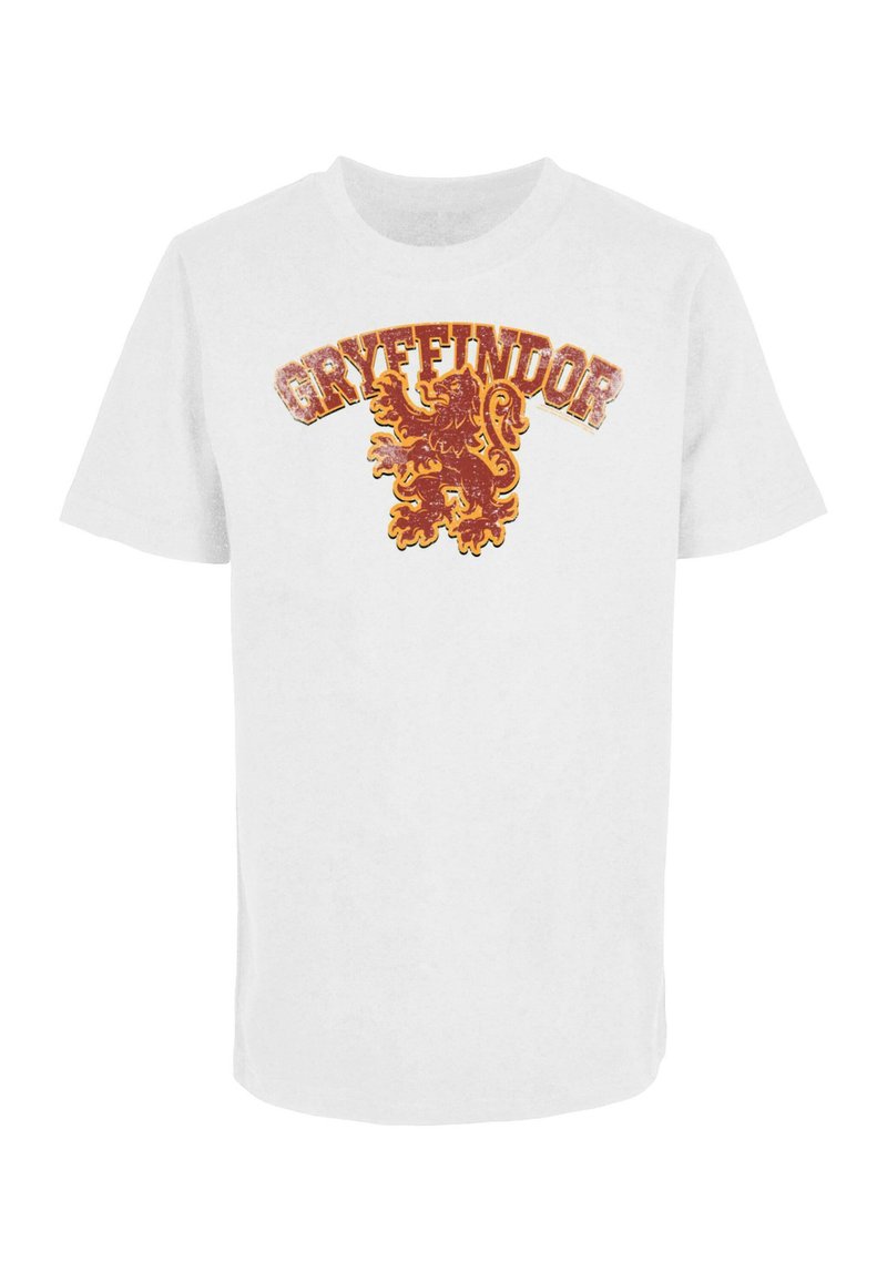 Tricou alb din bumbac, cu inscripția "Gryffindor" în roșu și auriu și un grafic cu un leu într-un stil deteriorat. Manșete scurte, design cu gât rotund.