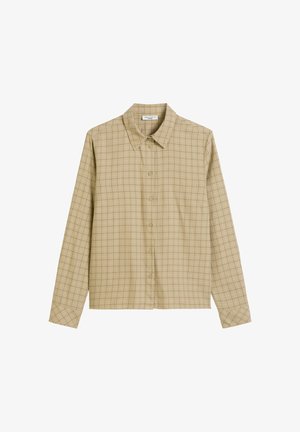 Beige button-up shirt with a collar, featuring a checkered pattern in darker beige and green. Long sleeves with buttoned cuffs.