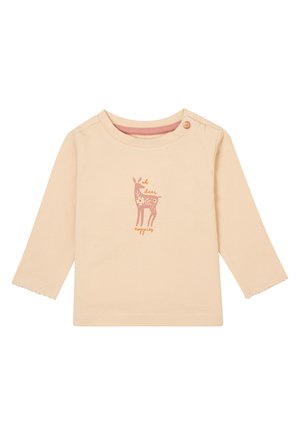 Langsleeve beige katoenen shirt met een ronde hals, voorzien van een roze hert grafiek en florale details. Knopsluiting op de schouder en geschulpte manchetten.
