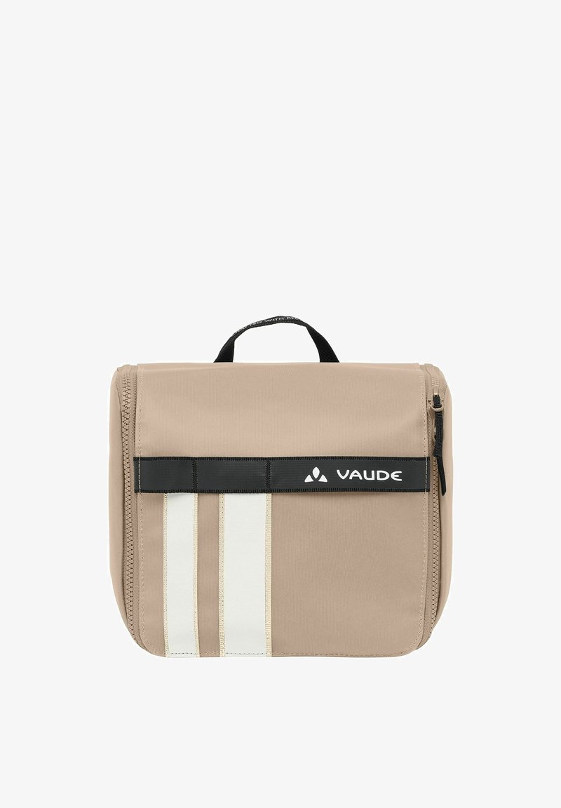 Borsa in tessuto beige con una tracolla nera solida caratterizzata da strisce bianche. Chiusura a zip e maniglia superiore per un facile trasporto. Logo VAUDE visibile.