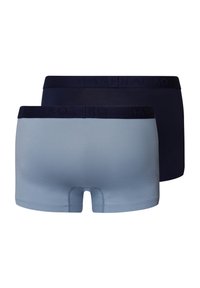Boxershorts i ljusblått och mörkblått. Mjuk, stretchig tyg med synliga elastiska midjeband försedda med präglat varunamn. Klassisk design.