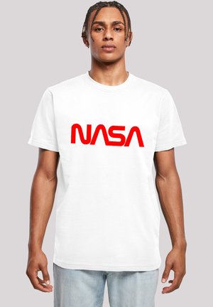 White cotton t-shirt featuring a prominently displayed red "NASA" logo across the center, short sleeves, and a crew neckline.