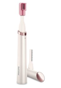 Brosse à dents électrique Philips avec un manche blanc, une tête de brosse rose et des accents or rose. Inclut un petit accessoire de coupe détachable.