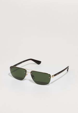 Metal frame sunglasses with green tinted lenses, angular design, gold accents, and dark brown temple arms. No visible patterns.