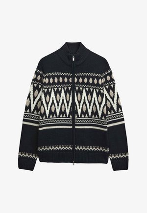 Sweter zapinany na zamek w ciemnoniebieskim kolorze z kremowymi geometrycznymi wzorami. Posiada ściągacze na mankietach oraz wysoki kołnierz dla zapewnienia ciepła.