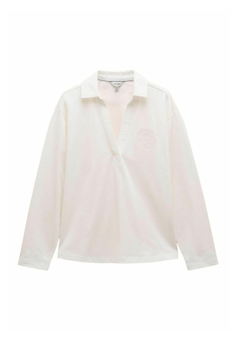 Kerge, pika varrukaga polo särgist off-white puuvillast. Omab kaelust, V-kujulist avamist ja väikest broderi detaili rinna piirkonnas.