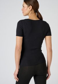 Damart MANCHES COURTES THERMOLACTYL SENSITIVE - Maglietta intima - noir