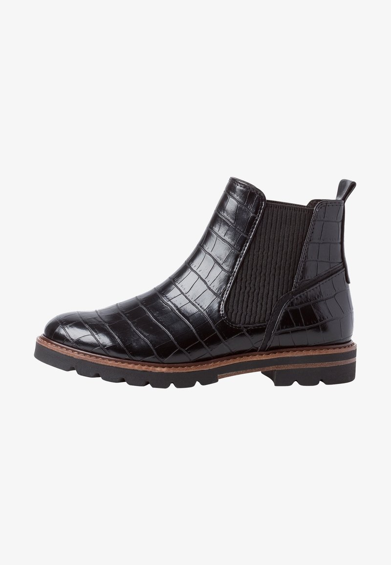 Botte Chelsea en cuir noir à motif crocodile, avec des panneaux latéraux élastiques et une semelle contrastante marron. Elle dispose d'un bout rond et d'une solide adhérence.