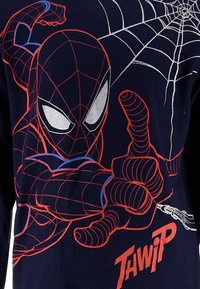 Navy blue long-sleeve shirt featuring a Spider-Man graphic in red and silver, depicting the character shooting web from a web shooter.