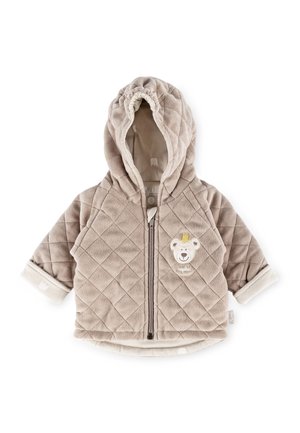 Veste pour bébé en beige doux matelassé avec capuche, fermeture éclair frontale, et patch visage d'ours portant une couronne sur la poitrine.