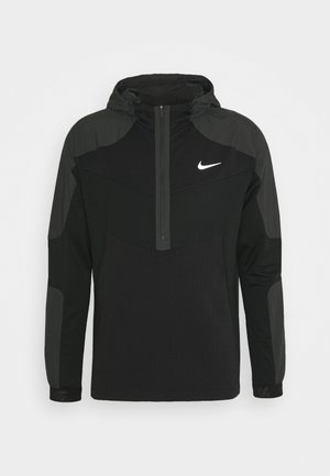 Felpa nera con cappuccio Nike, con pannelli grigio scuro sulle spalle e sulle maniche, mezza zip frontale e logo Nike swoosh bianco sul petto.