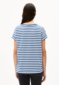 Blue and white striped t-shirt with short sleeves, round neckline, and a relaxed fit. Cotton material, side slits at the hem.