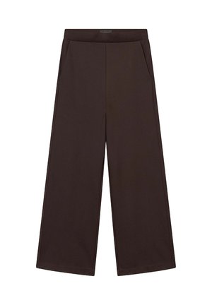 Bruine wijde broek van zacht materiaal, met een elastische tailleband, zijzakken en een gladde textuur zonder duidelijke patronen.
