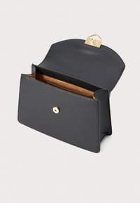Black leather rectangular handbag with gold clasp, open flap revealing a tan interior lining and an inner pocket.