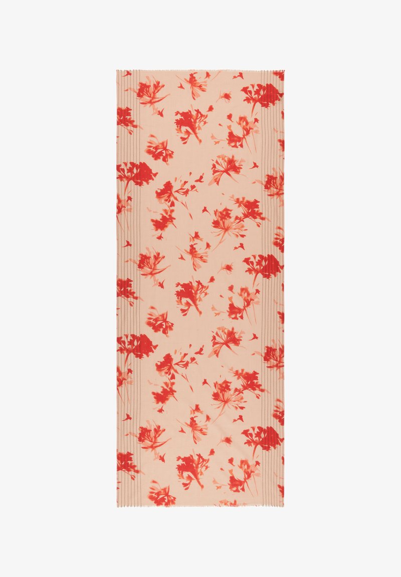 Écharpe rectangulaire beige avec des motifs floraux rouges dispersés et des lignes cousues subtiles courant verticalement près des bords.