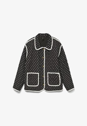 Černá prošívaná bunda s bílými puntíky, kontrastním bílým lemem, dvěma předními kapsami a zlatými knoflíky. Zapínání na knoflíky s límečkem.