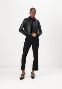 COACH SNAP FRONT SHRUNKEN JACKET - Lederjacke - black