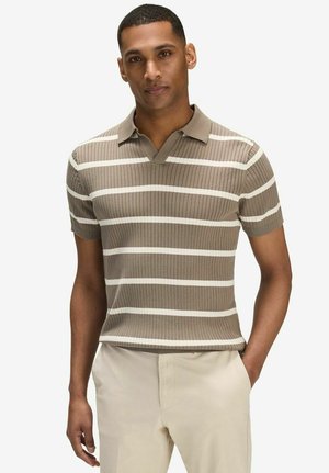 Kortærmet polo shirt i ribbet stof, med vandrette beige og hvide striber, v-halskrave og afslappet pasform.