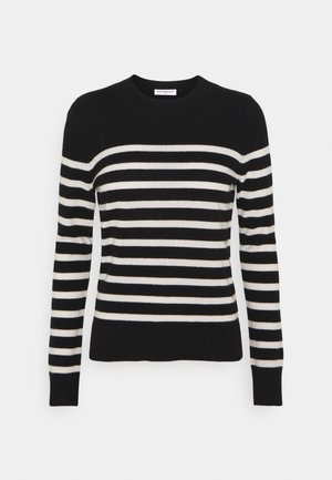 Black and cream striped sweater with a round neckline, long sleeves, and ribbed cuffs and hem, made from soft knit fabric.