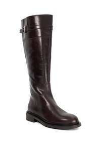 Brown leather knee-high boot with a smooth finish, low block heel, and a decorative buckle detail near the top. Classic design.