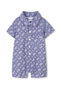 Salopette a maniche corte di colore lilla chiaro con un motivo geometrico bianco, dotata di colletto, taschino anteriore e chiusura a bottone. Realizzata in tessuto.