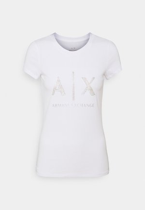 White cotton t-shirt with short sleeves, featuring a shiny silver "AIX" logo and "ARMANI EXCHANGE" text in a reflective design.