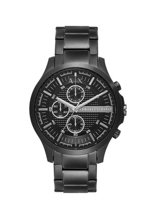 Montre-bracelet en acier inoxydable noir avec un cadran noir texturé, trois sous-cadrans, et des index et aiguilles heure en argent luminescents. Fonction chronographe.