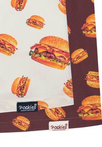 Musterstoff mit verschiedenen Hamburgern auf einem cremefarbenen und dunkelbraunen Hintergrund, mit Beschriftungen "Pockies Couch Couture."