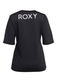 Black short-sleeve top made of smooth fabric featuring a round neckline and white "ROXY" logo printed prominently on the back.