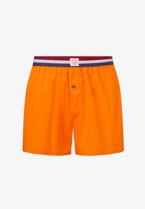 Leuchtend orangefarbene Herren-Boxershorts mit elastischem Bund, versehen mit roten, weißen und blauen Streifen und einem Löwenlogo-Patch mittig vorne.