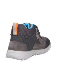 Gray and black ankle shoe with a textured upper, orange and gray accents, and a blue interior, featuring a Velcro strap and rubber sole.