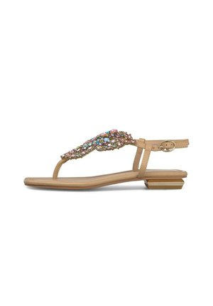 Sandalia plana beige con tacón bajo apilado, hebilla en la correa del tobillo y adornos de gemas de colores en la tira frontal en forma de T.