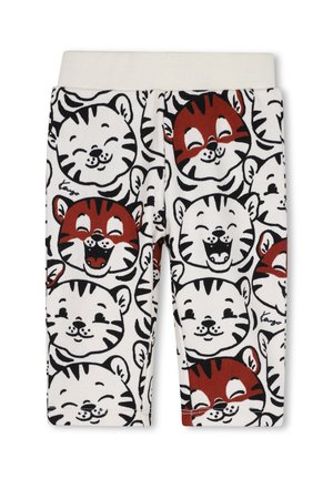 Pantalon pour enfants avec une ceinture blanche présentant un motif répétitif de visages de tigres souriants dessinés en blanc et marron.