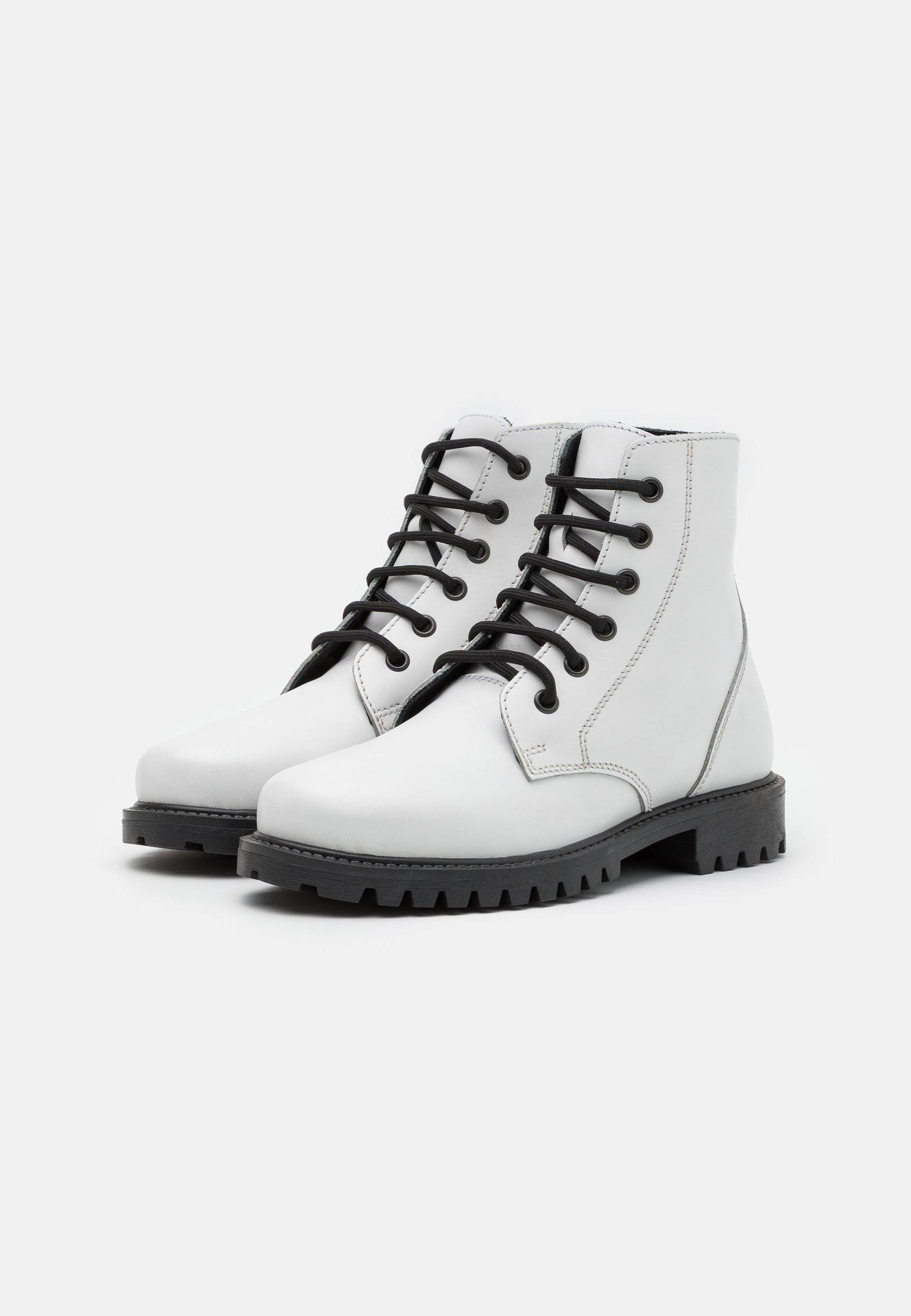 remi zip combat bootie bp