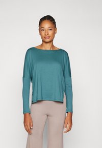Yogasearcher DAKSHA - Hosszú ujjú felső - paon