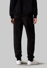 Calvin Klein Jeans Pantalones deportivos - ck black