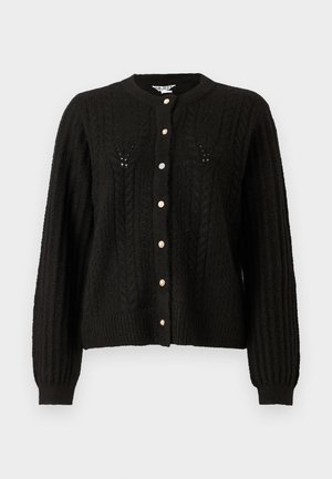 Black cable-knit cardigan featuring a round neckline, long sleeves, and gold-tone button closures along the front. Textured knit pattern.