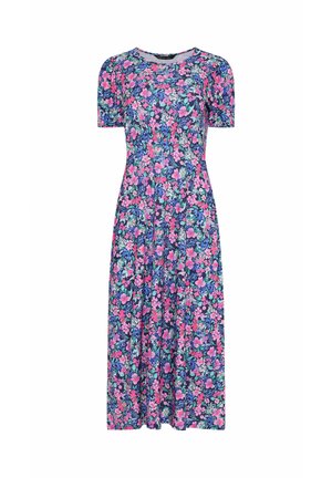 Midi-mekko, jossa lyhyet pönkköhihat ja kirkas kukkakuosi, jossa on vaaleanpunaisia, purppuranvihreitä ja vihreitä sävyjä tummansinisellä taustalla.