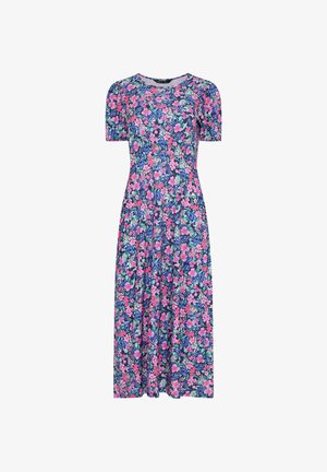 Midi-mekko, jossa lyhyet pönkköhihat ja kirkas kukkakuosi, jossa on vaaleanpunaisia, purppuranvihreitä ja vihreitä sävyjä tummansinisellä taustalla.