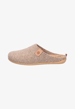 Beige felt slipper with rounded shape, contrasting brown rubber sole, and a small leather tag with a circular logo on the side.