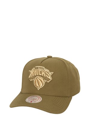 Olive green baseball cap featuring an embroidered New York Knicks logo in beige. Structured design with a flat brim and adjustable strap.