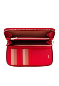 Red leather wallet with a zip closure. Interior features a brown lining, several card slots in light shades, and a central zippered compartment.