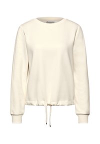 Felpa bianca con collo rotondo, maniche lunghe e orlo arricciato. Presenta un cordoncino in vita e polsini a costine. Tessuto dalla texture liscia.