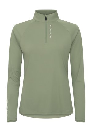 Top verde chiaro con zip a metà realizzato in un tessuto liscio e elastico. Caratterizzato da maniche lunghe e logo del brand stampato verticalmente sulla manica sinistra.