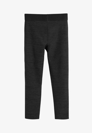 Leggings de sport noirs en jersey doux, dotés d'une large taille et d'une texture lisse avec un motif léger chiné.