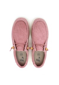 Pink suede shoes with a round toe design, featuring elastic laces and wooden bead accents. Textured rubber sole.