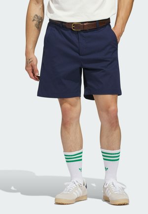 - Krótkie spodenki sportowe