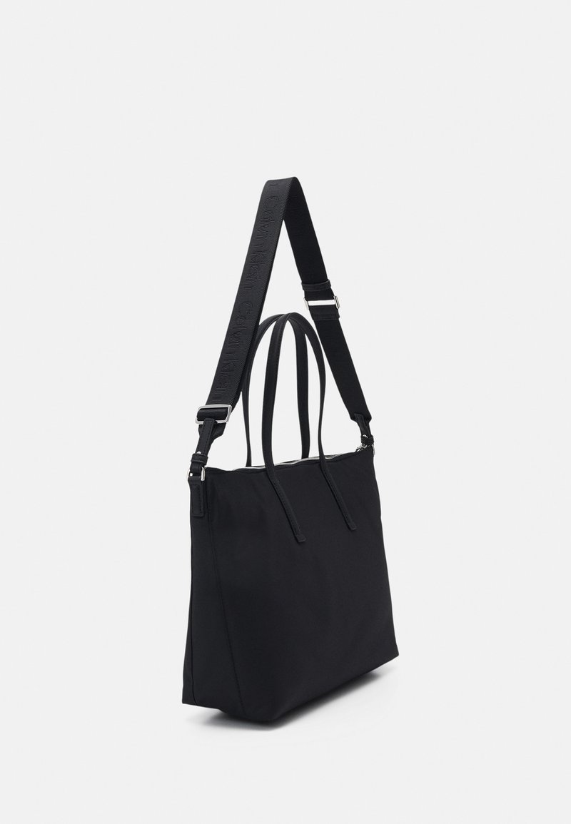 Calvin Klein MUST NYLON - Tote bag - black 