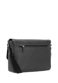 Schwarze Leder-Umhängetasche mit glatter Textur, verstellbarem Riemen und einer Reißverschlusstasche auf der Rückseite für sichere Aufbewahrung.