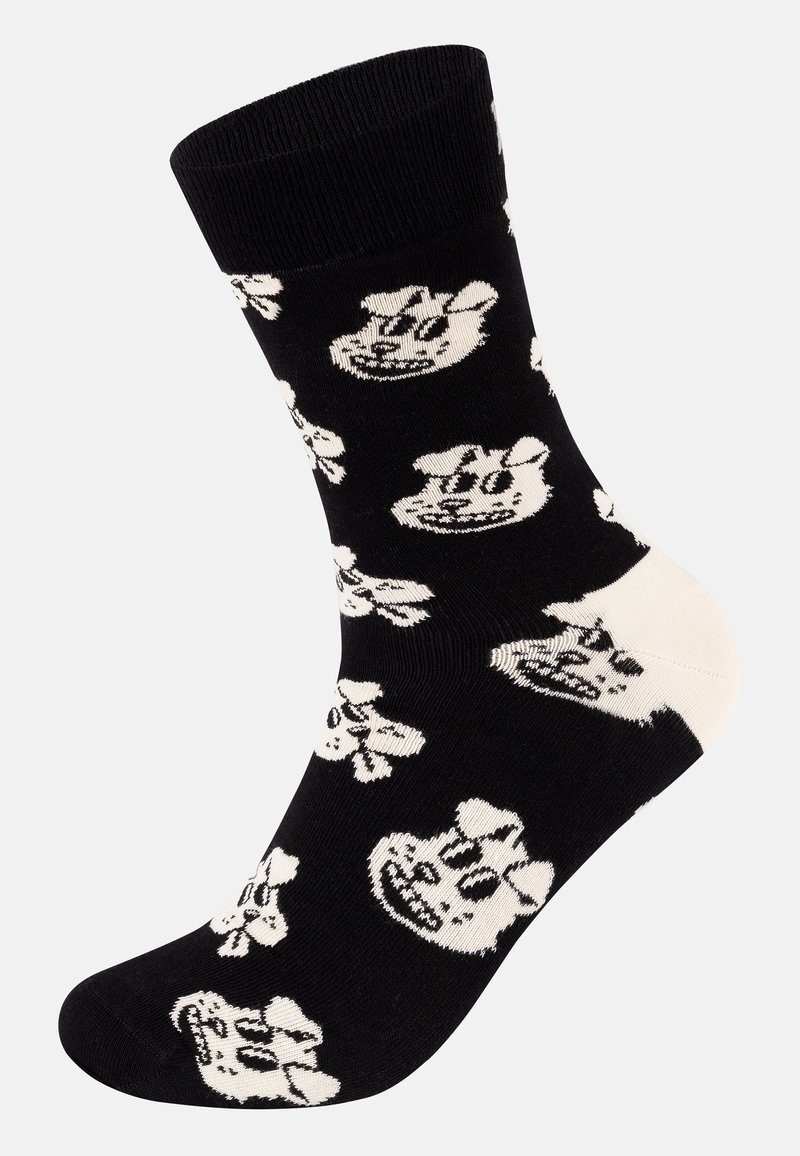 Schwarze Socken mit weißen Cartoon-Charakter-Gesichtern. Das Design weist sich wiederholende Muster und einen einfarbigen schwarzen Bund mit strukturiertem Strick auf.